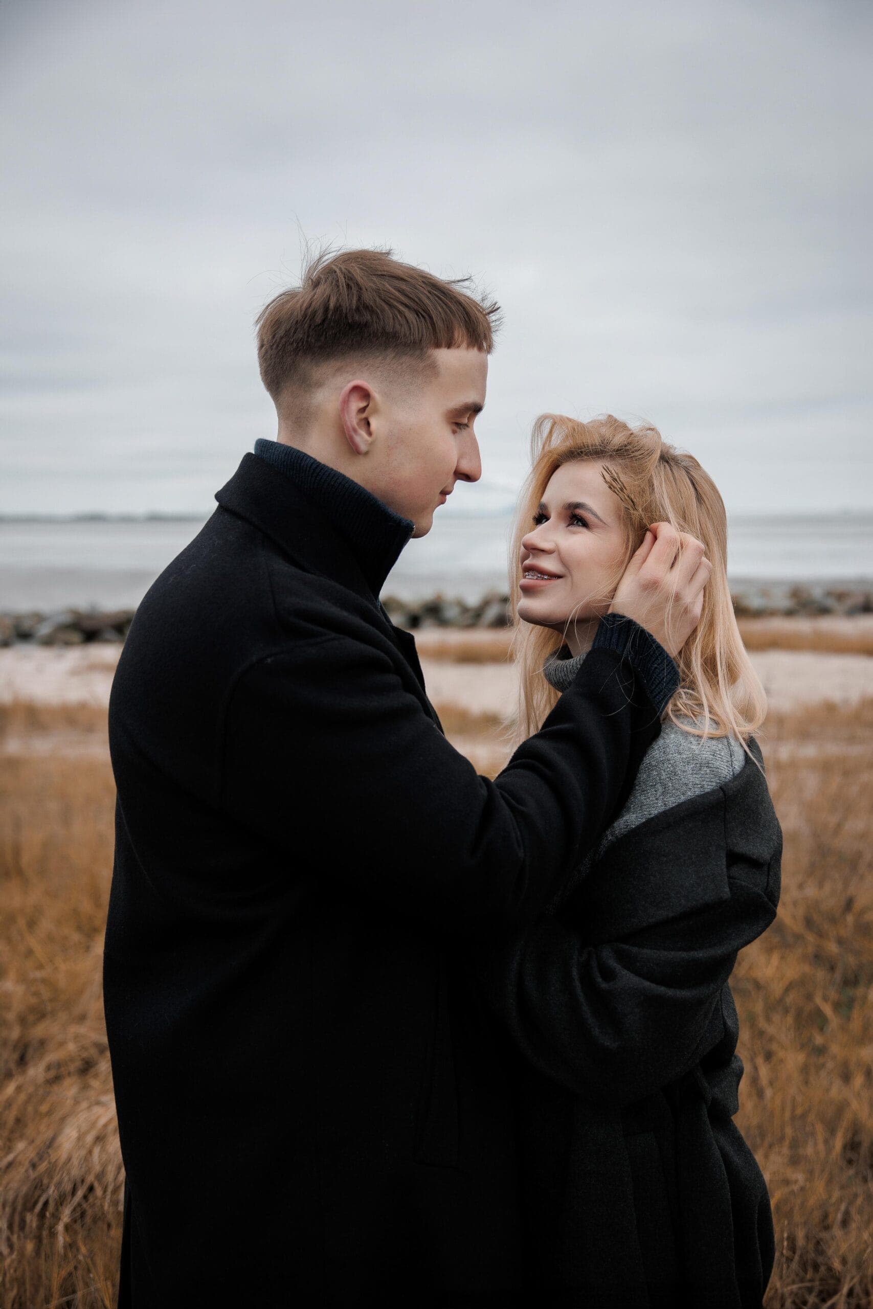 Open fields, wide sky, and two people entirely at ease with one another.