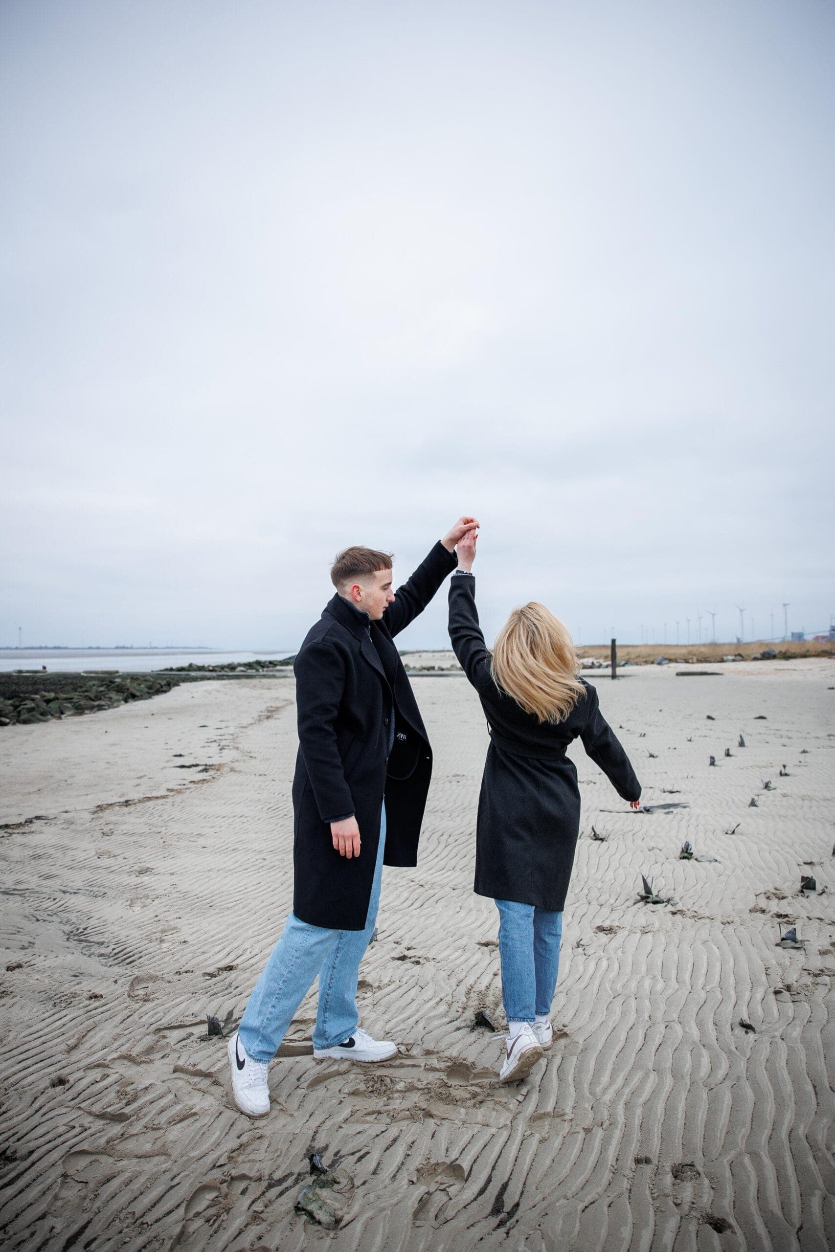Open fields, wide sky, and two people entirely at ease with one another.