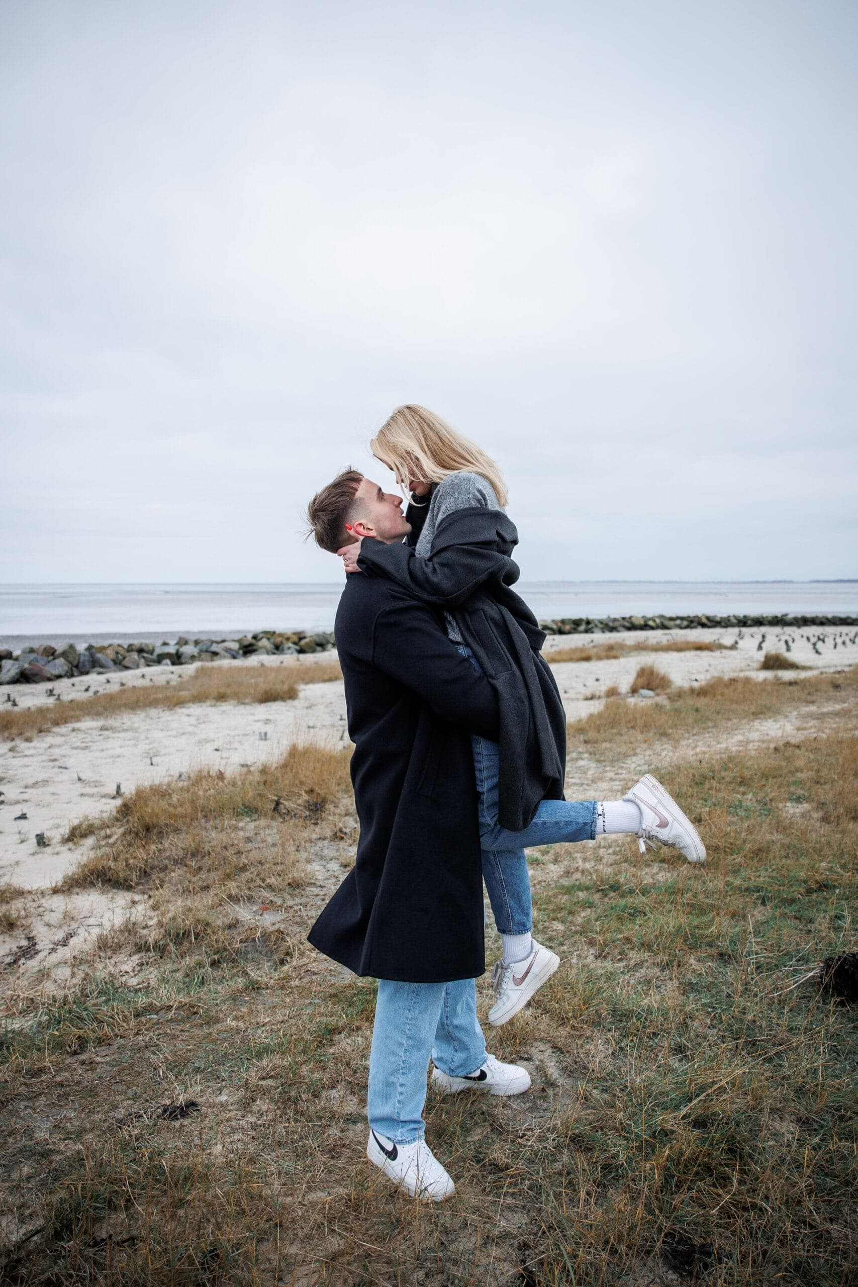 Open fields, wide sky, and two people entirely at ease with one another.