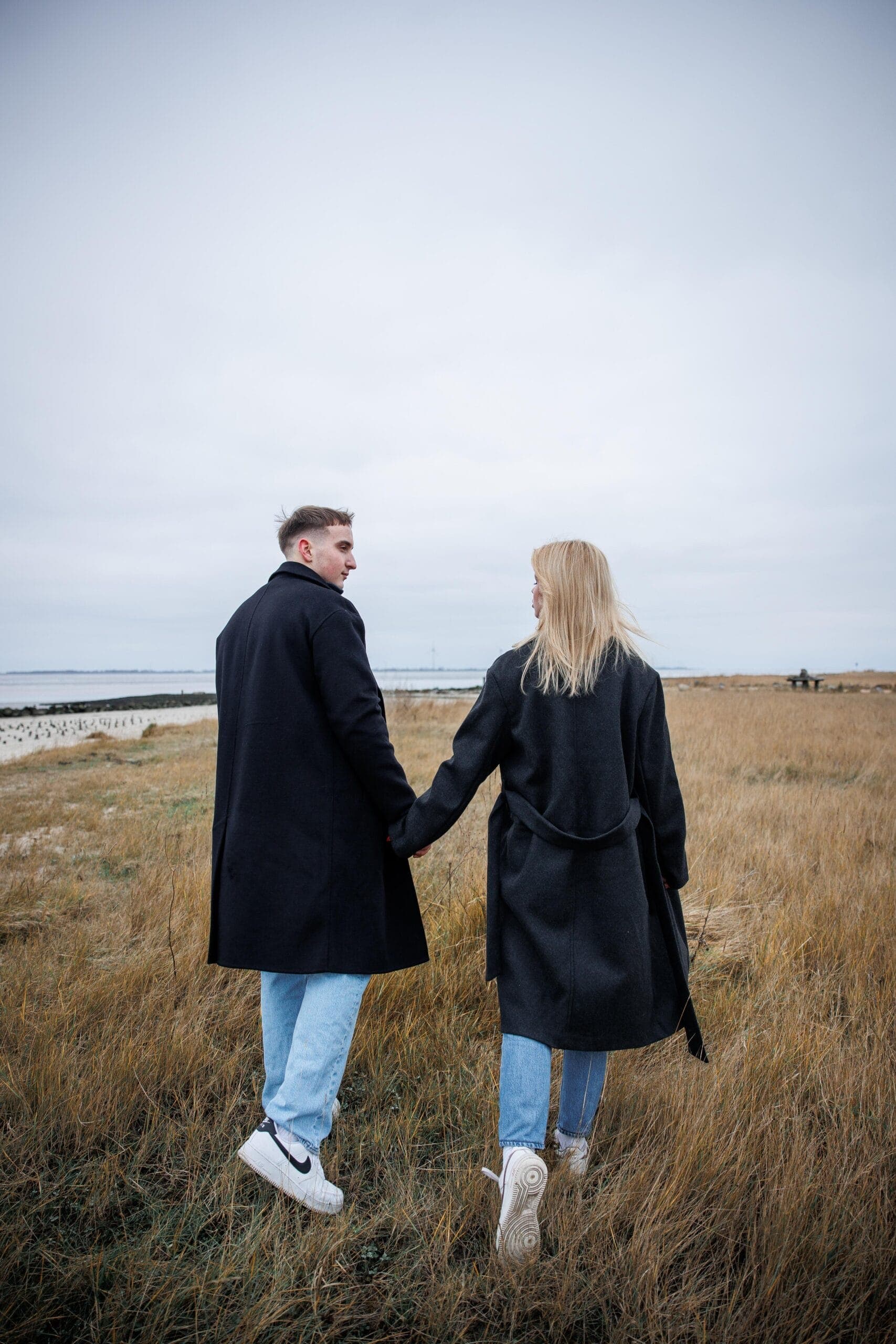 Open fields, wide sky, and two people entirely at ease with one another.