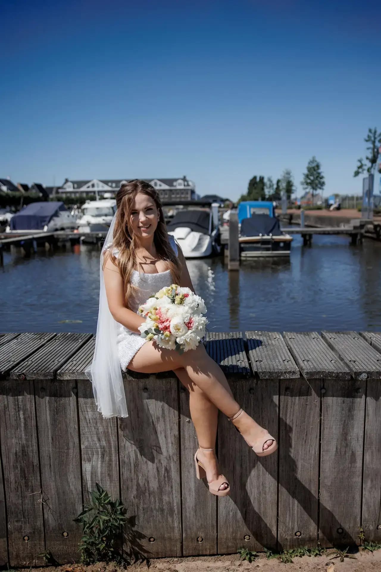 A celebration beside the water in Blauwestad, where afternoon light turned silver across the harbour.