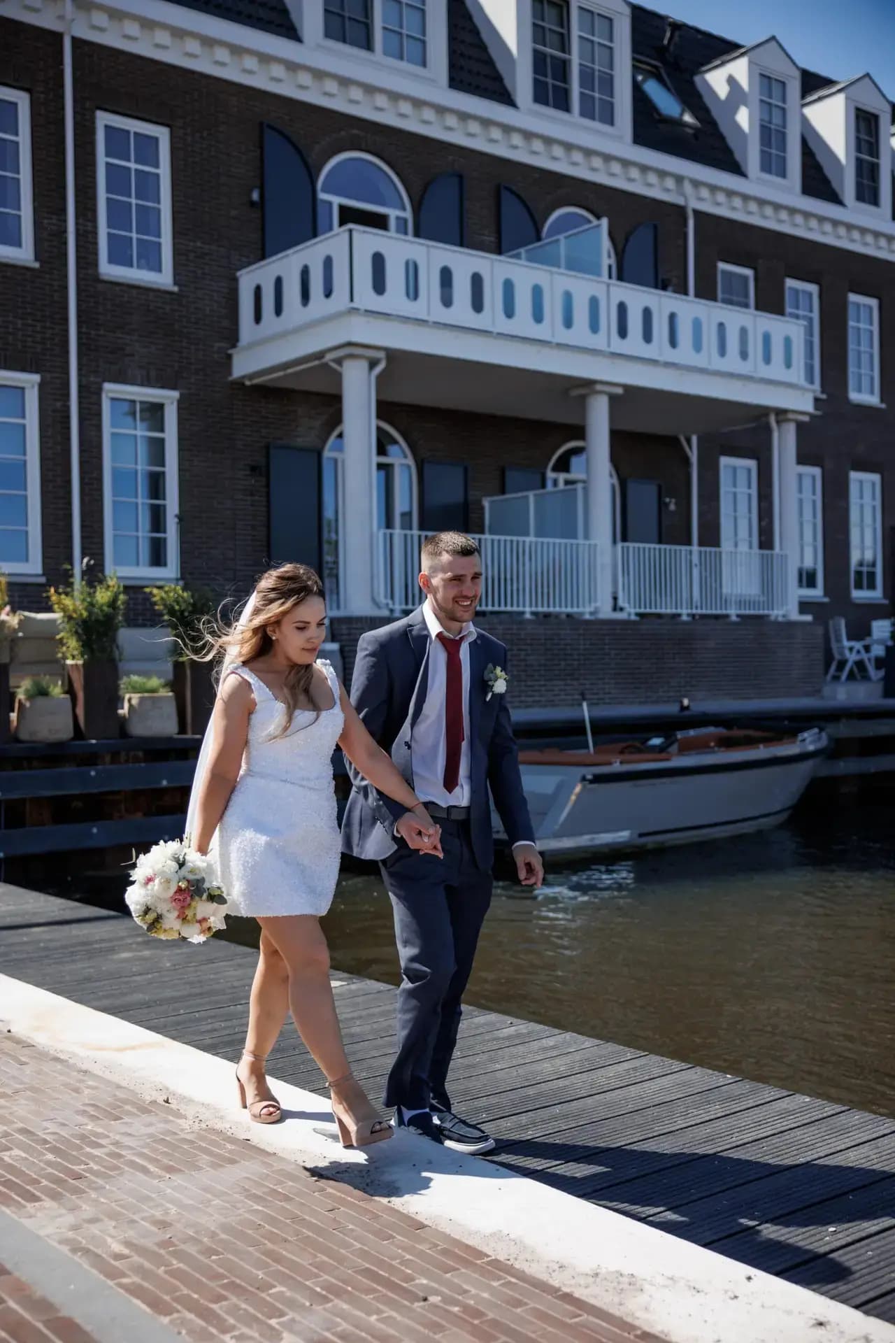 A celebration beside the water in Blauwestad, where afternoon light turned silver across the harbour.