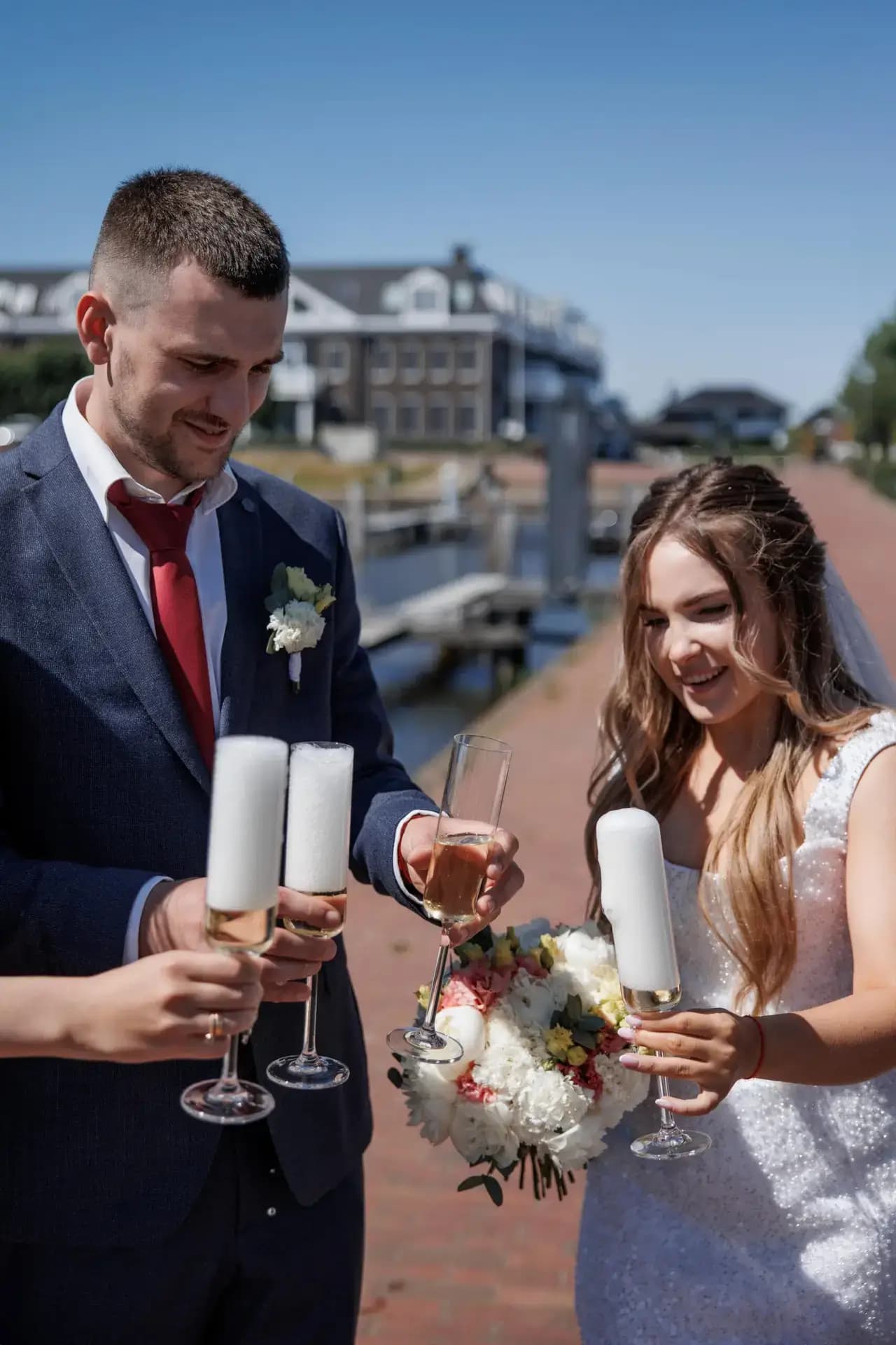 A celebration beside the water in Blauwestad, where afternoon light turned silver across the harbour.