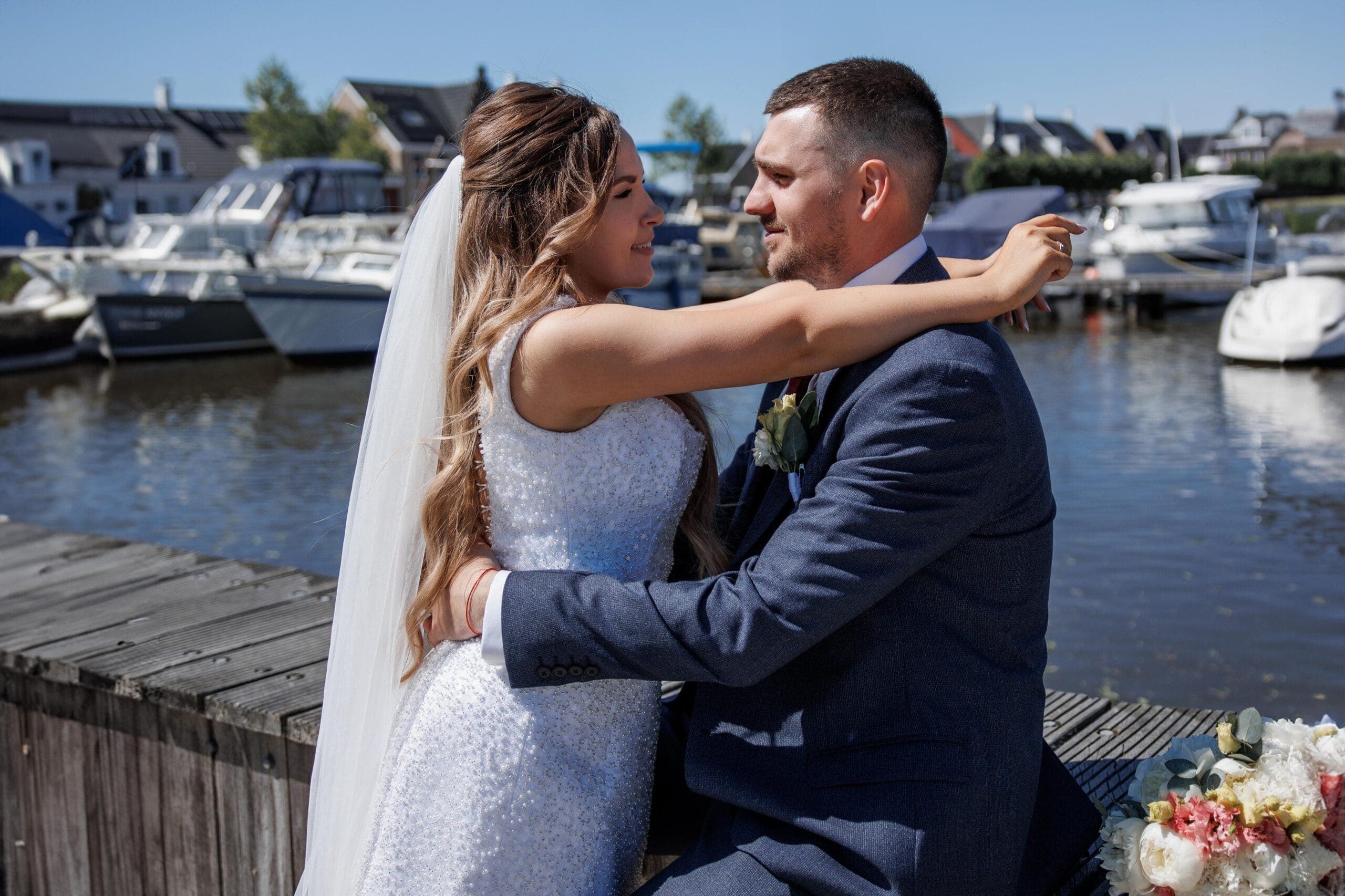 A celebration beside the water in Blauwestad, where afternoon light turned silver across the harbour.