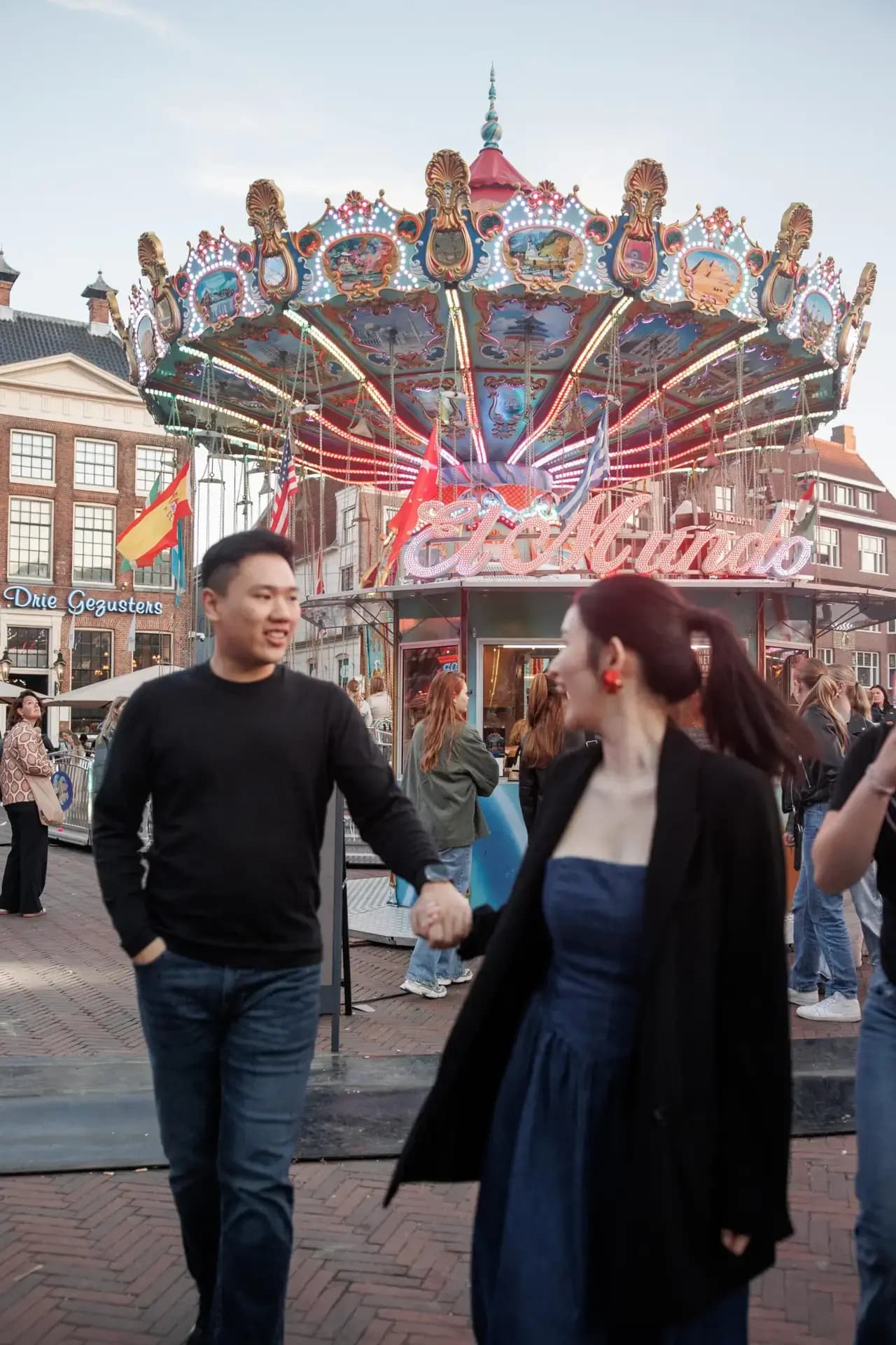Couples photography near historic architecture in Groningen
