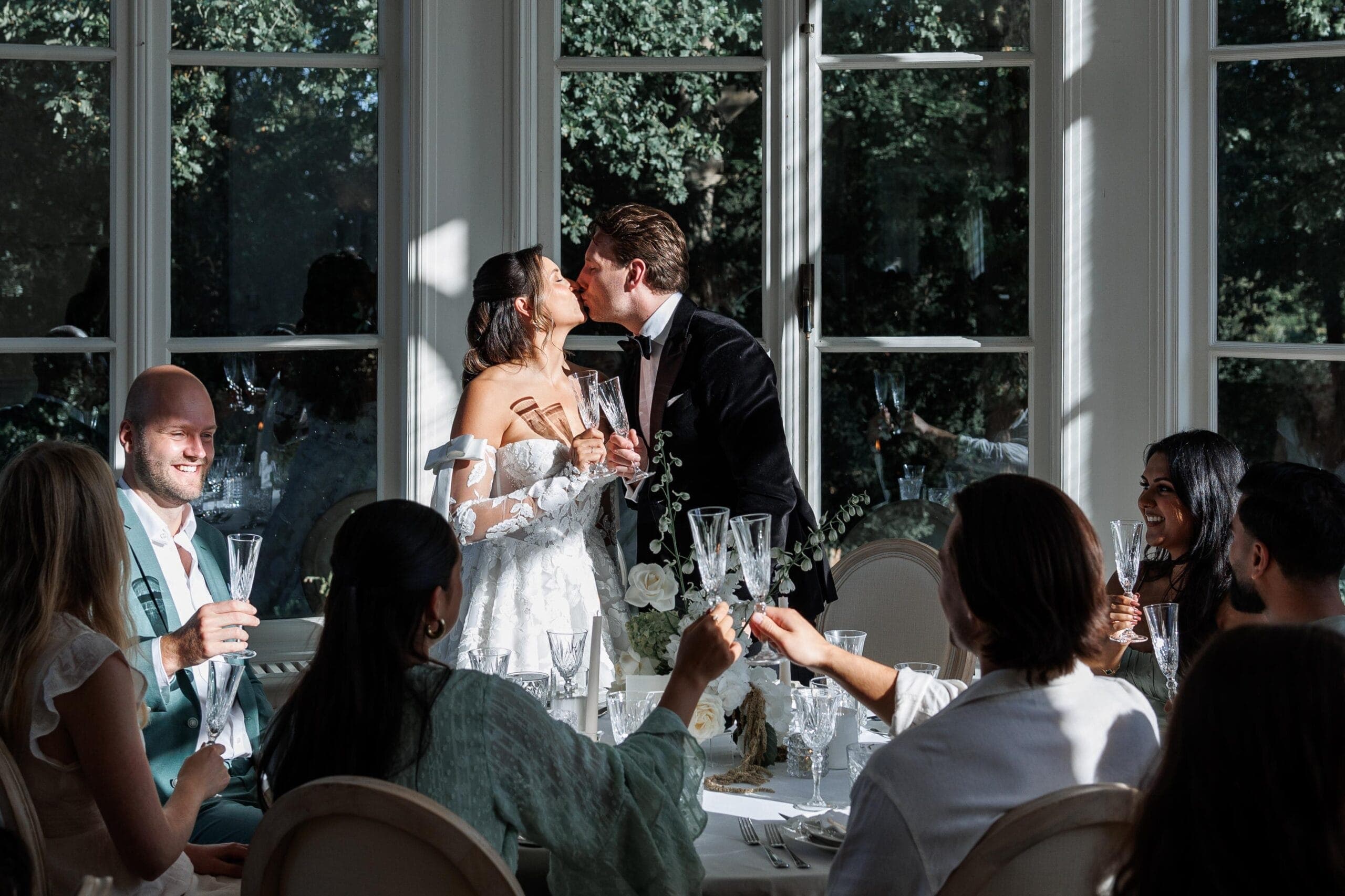 An estate celebration framed by old gardens and quiet luxury.