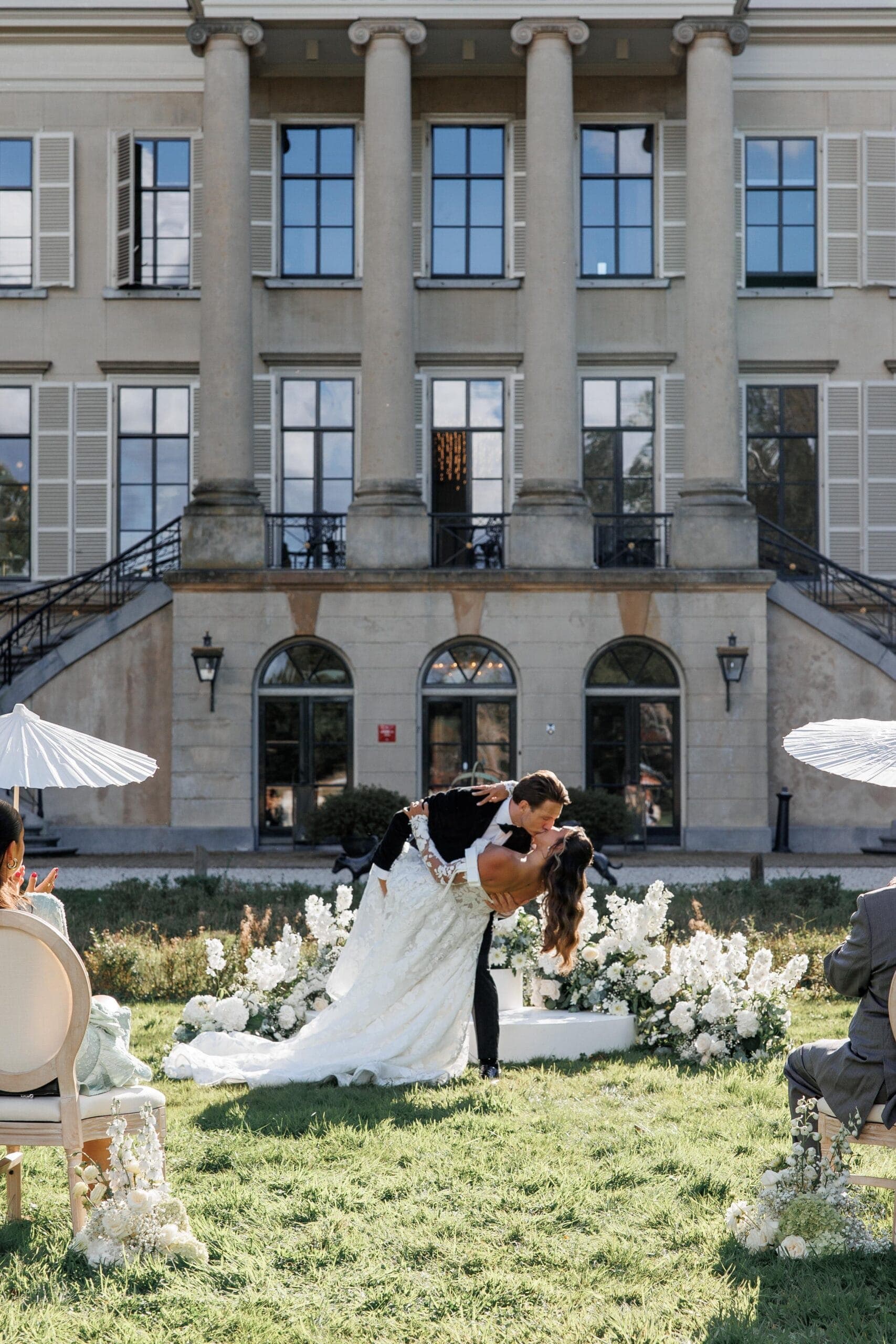 An estate celebration framed by old gardens and quiet luxury.