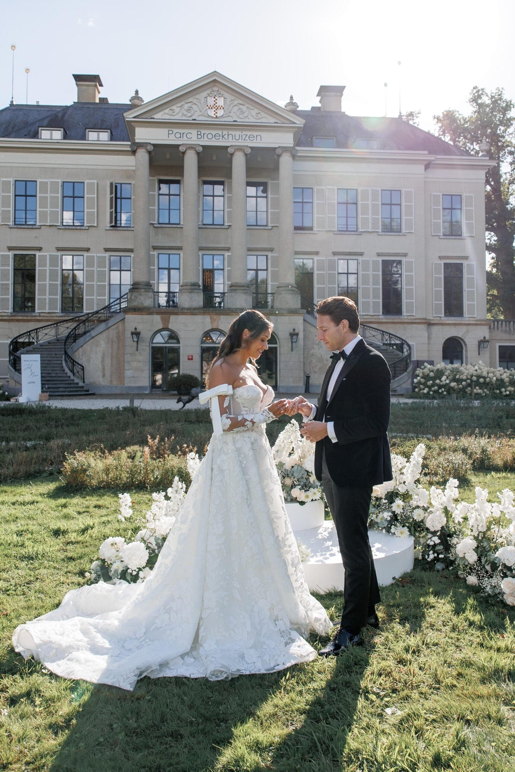 An estate celebration framed by old gardens and quiet luxury.