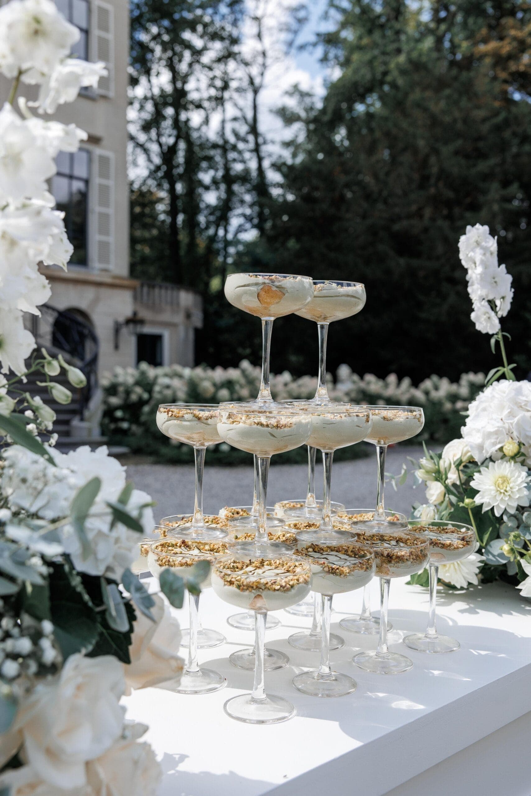 An estate celebration framed by old gardens and quiet luxury.