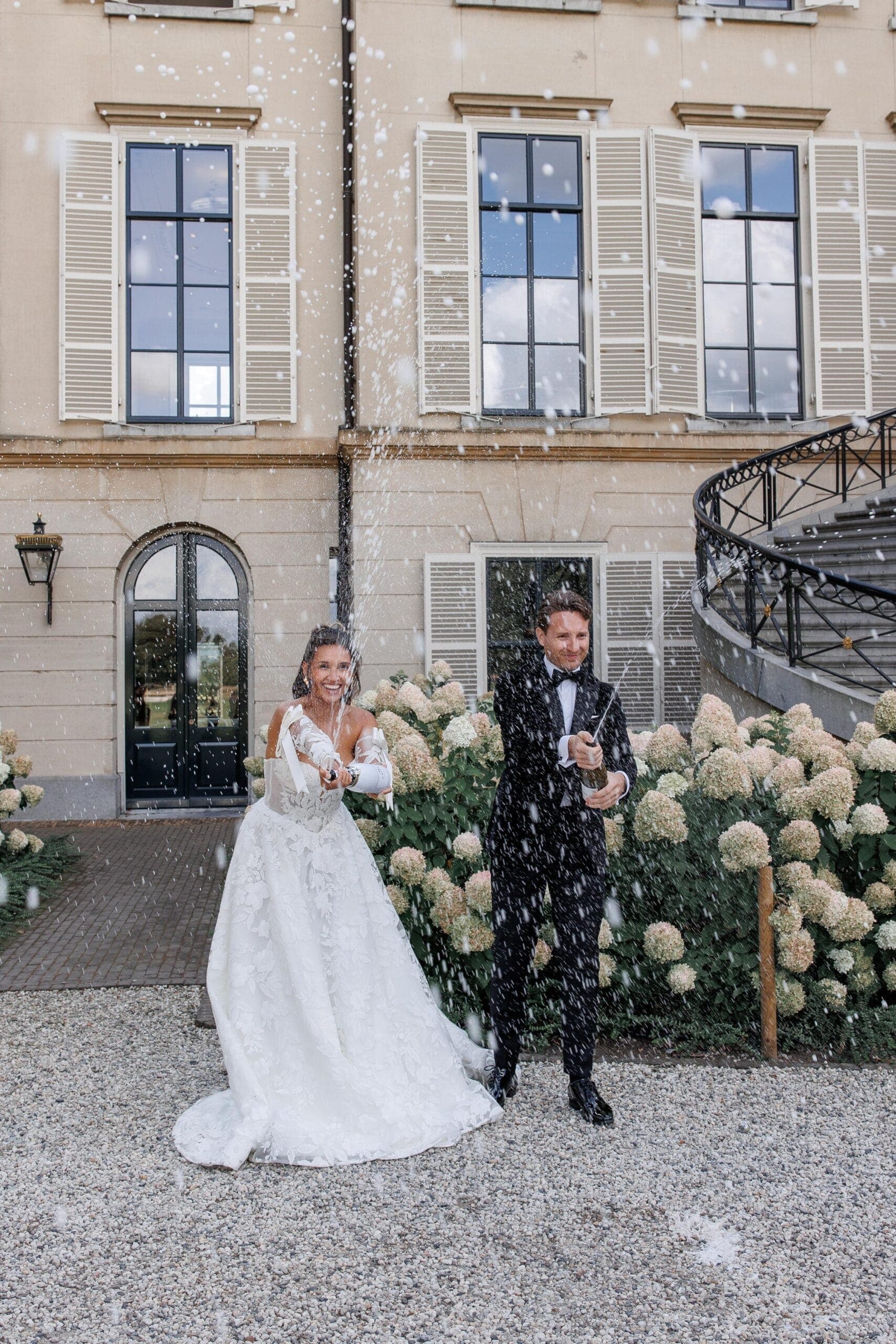 An estate celebration framed by old gardens and quiet luxury.