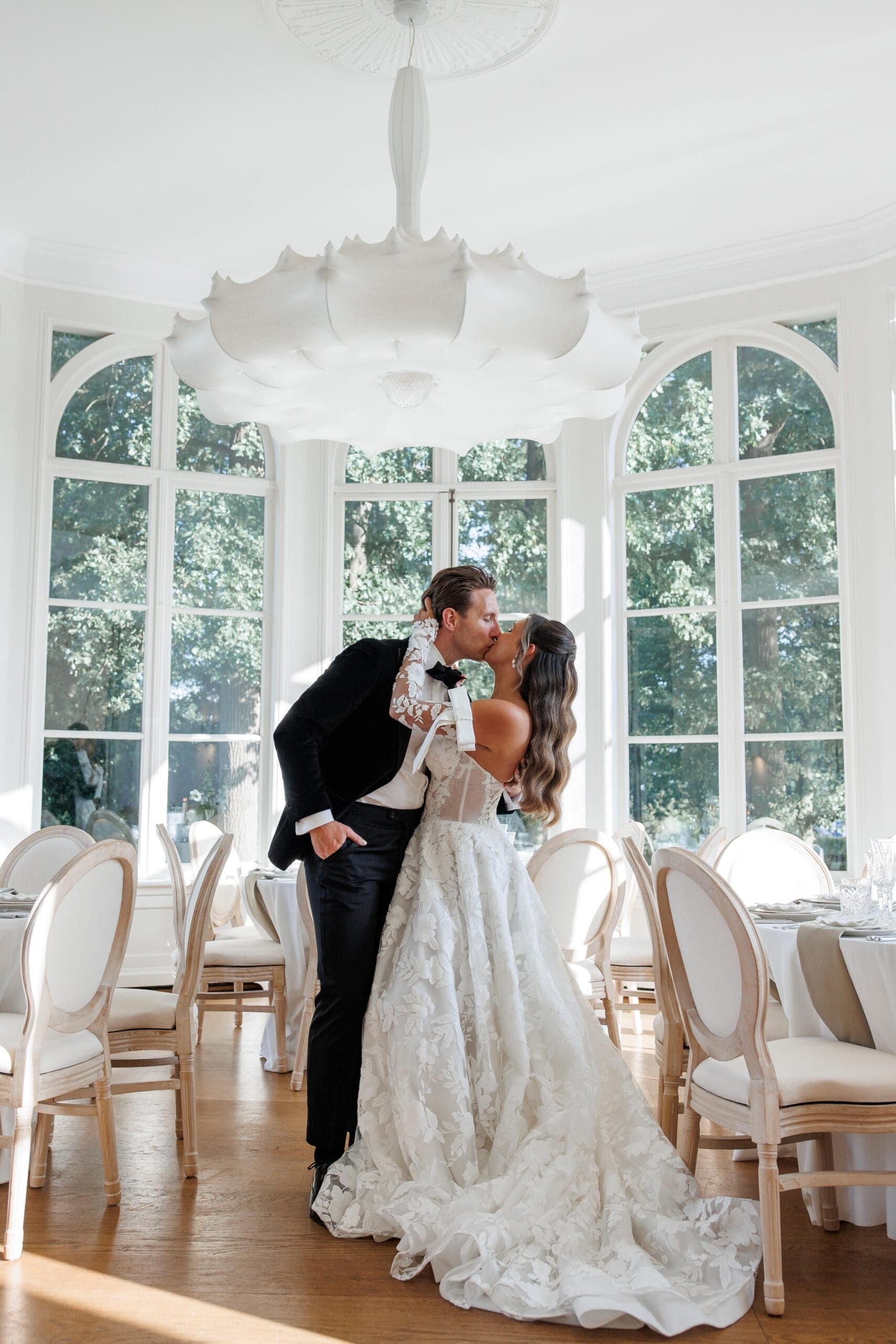 An estate celebration framed by old gardens and quiet luxury.