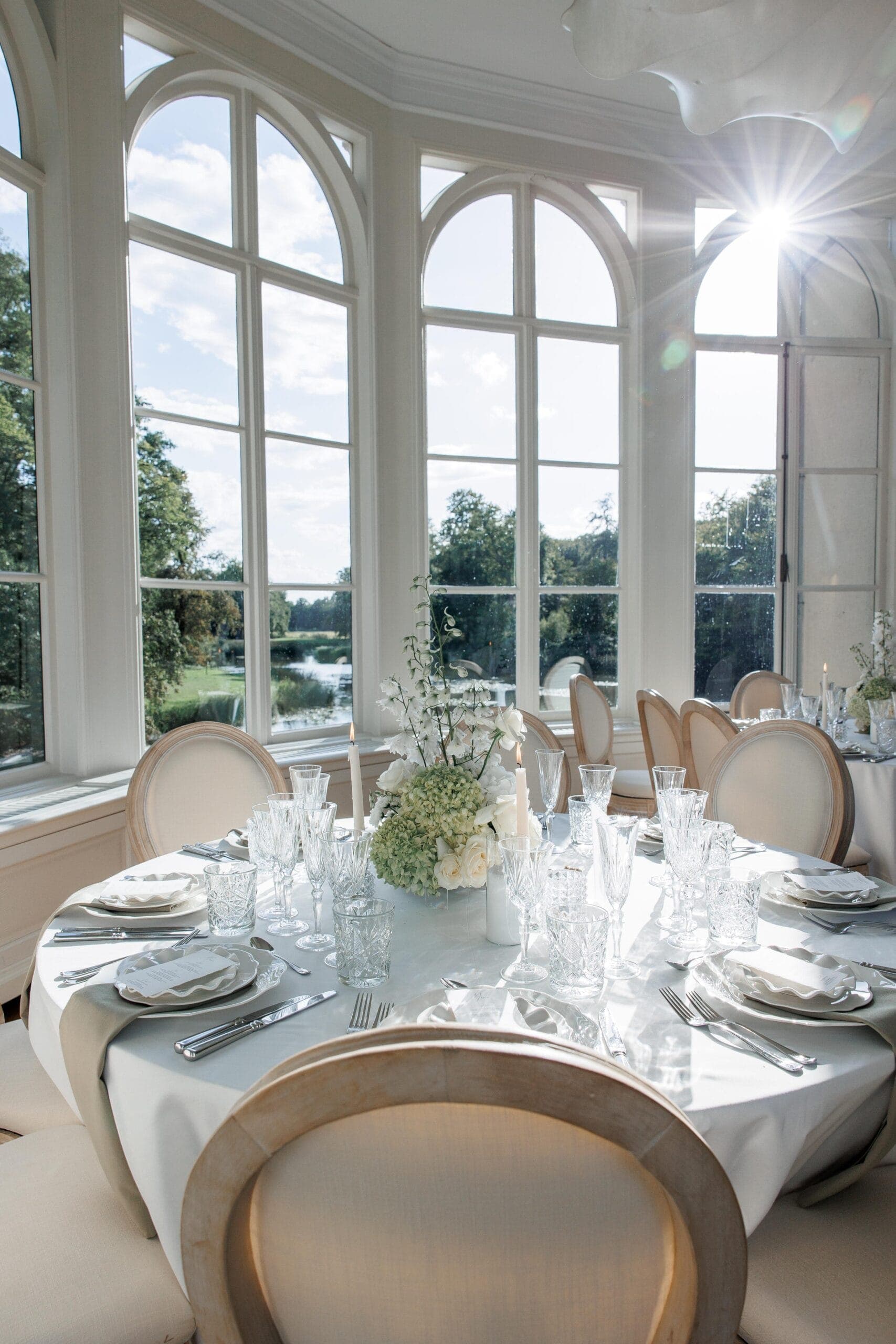 An estate celebration framed by old gardens and quiet luxury.