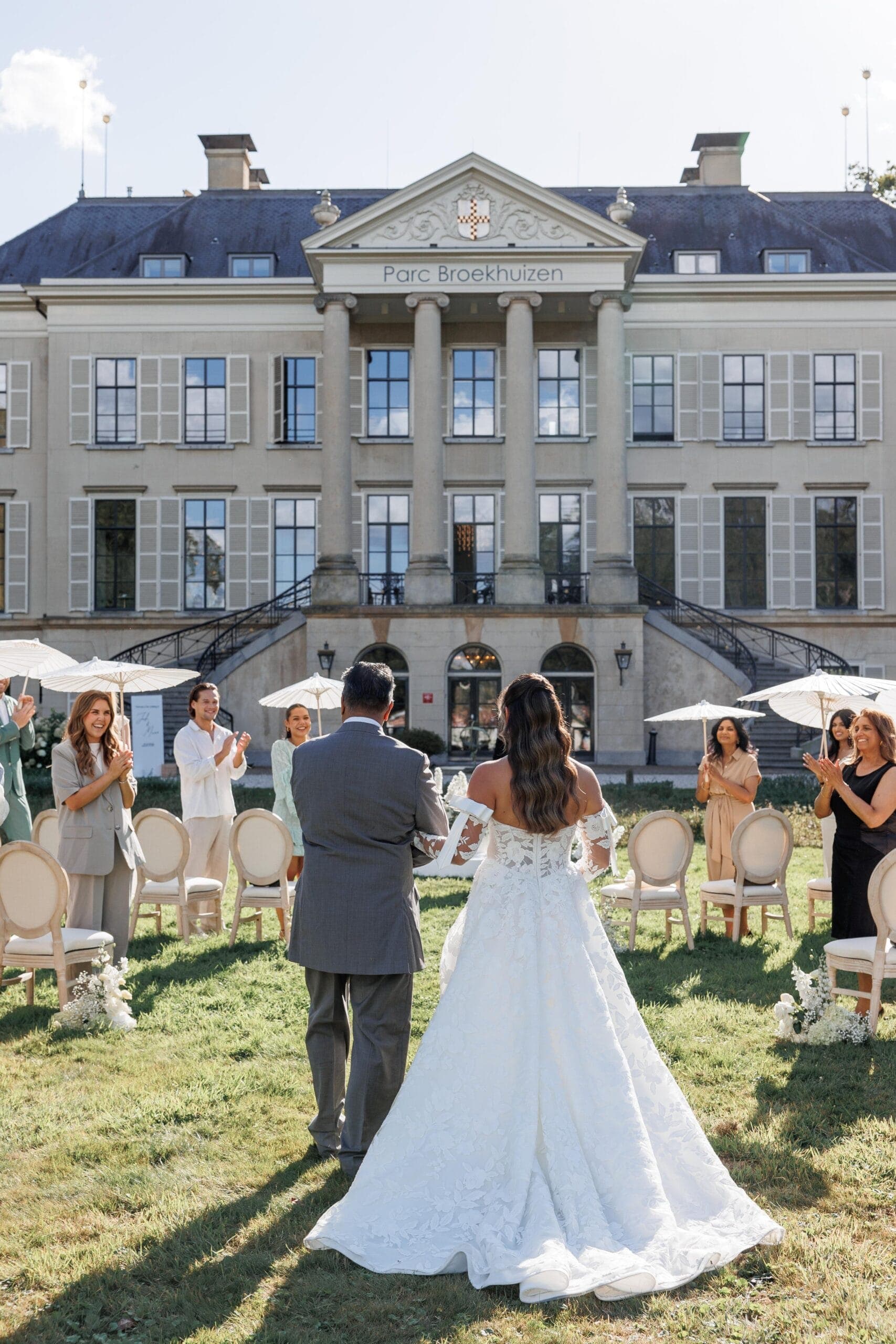 An estate celebration framed by old gardens and quiet luxury.