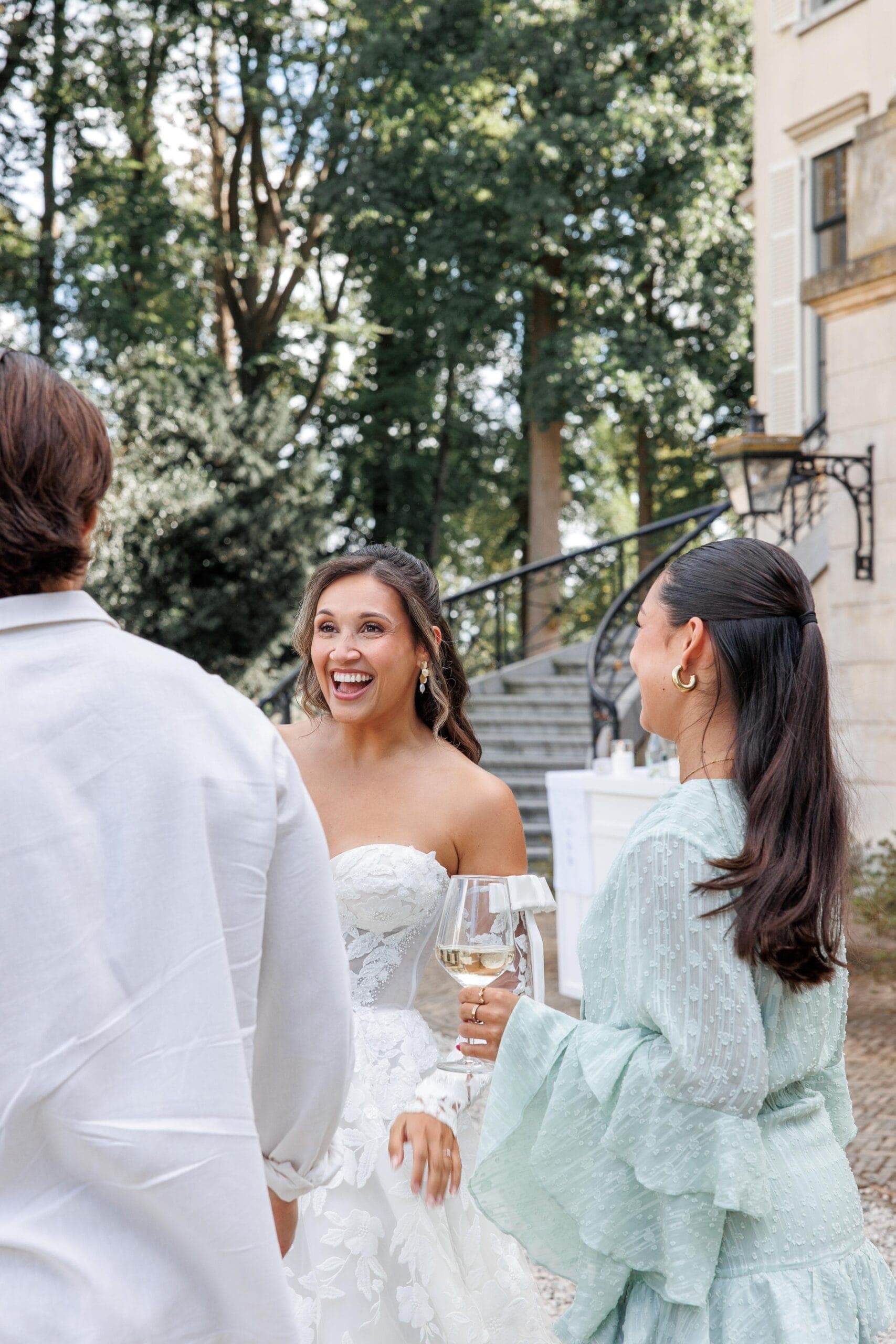 An estate celebration framed by old gardens and quiet luxury.