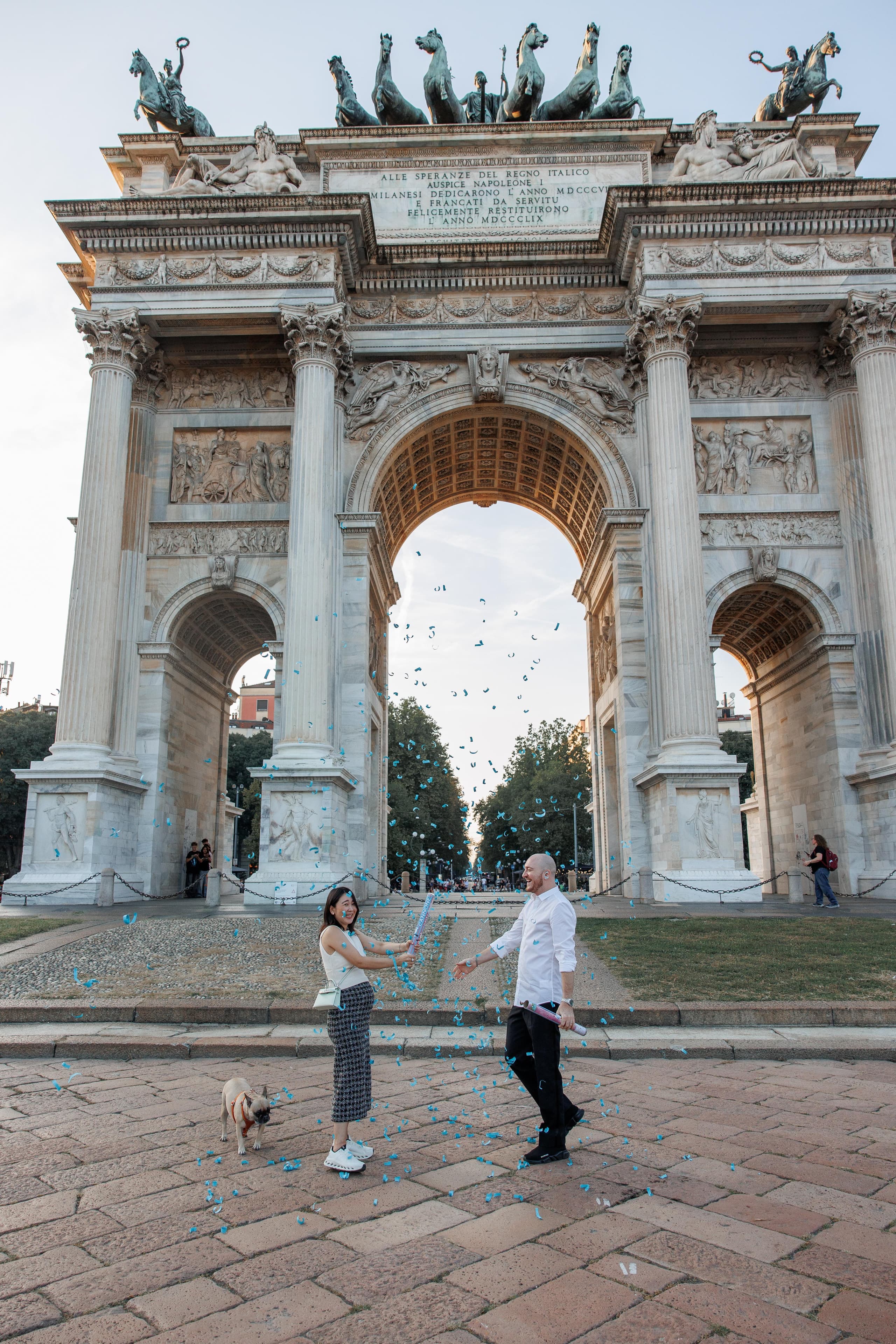 A joyful couple session among Milan's iconic landmarks, celebrating love and new beginnings.